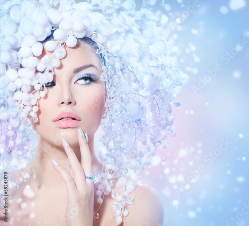 Photo: Winter Beauty. Beautiful Fashion Model Girl with Snow Hair style Winter Beauty. Beautiful Fashion Model Girl with Snow Hair style