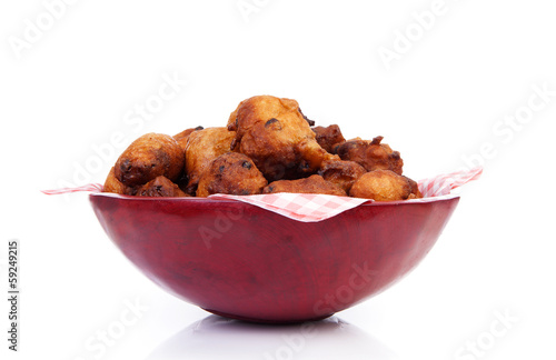 Photo: Bowl with Pile of Dutch donut also known as oliebollen, traditio Bowl with Pile of Dutch donut also known as oliebollen, traditio