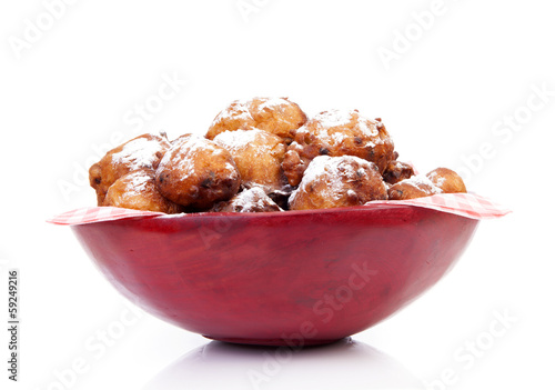 Photo: Bowl with Pile of Dutch donut also known as oliebollen, traditio Bowl with Pile of Dutch donut also known as oliebollen, traditio