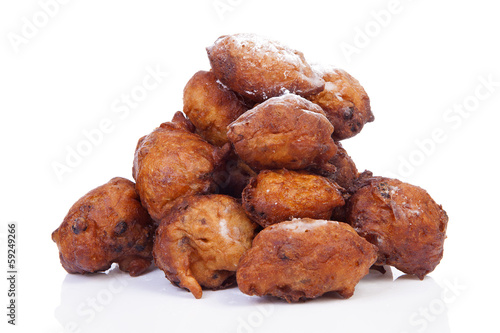 Photo: Pile of Dutch donut also known as oliebollen, traditional New Ye Pile of Dutch donut also known as oliebollen, traditional New Ye
