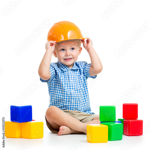 Photo: child playing with building blocks toy child playing with building blocks toy