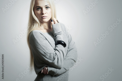 Photo: Beautiful blond woman in dress.accessories.flirt.fashion Beautiful blond woman in dress.accessories.flirt.fashion