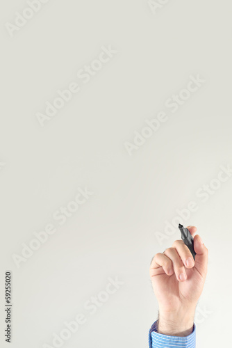 Photo: Businessman writing Businessman writing