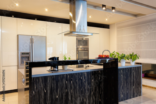 Photo: Urban apartment - Black counter in kitchen Urban apartment - Black counter in kitchen