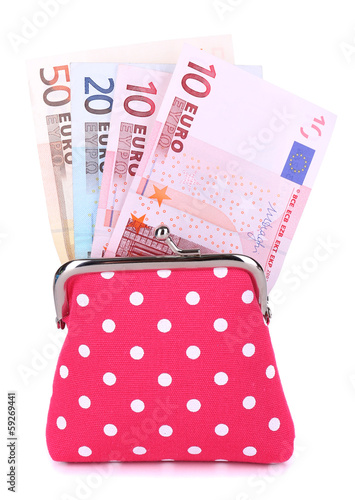 Photo: Pink purse with money isolated on white Pink purse with money isolated on white