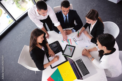 Photo: business people group in a meeting at office business people group in a meeting at office