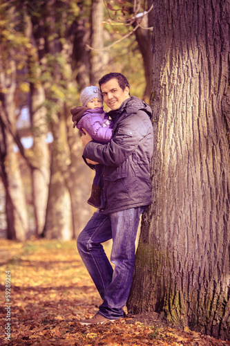 Photo: man in the autumn park man in the autumn park