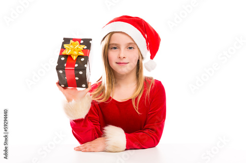 Photo: Christmas Santa kid girl happy excited with ribbon gift Christmas Santa kid girl happy excited with ribbon gift