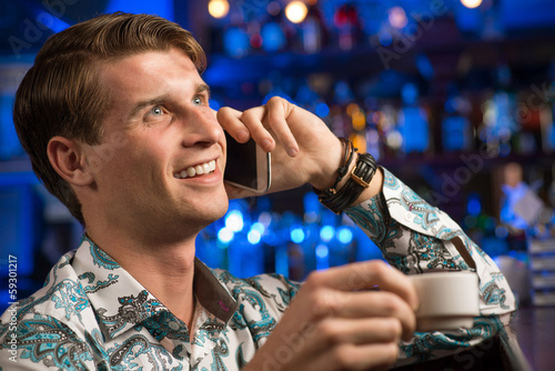 Photo: young man at the bar young man at the bar