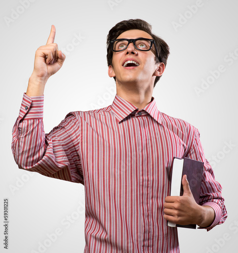 Photo: man raised his index finger man raised his index finger