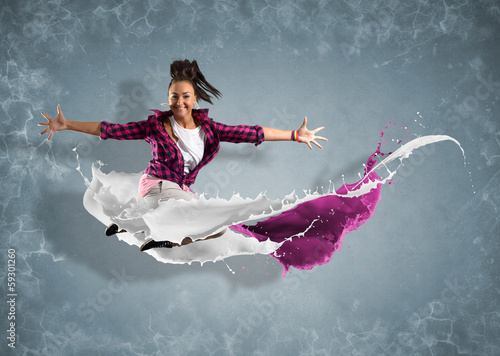 Photo: female dancer with splashes of paint female dancer with splashes of paint