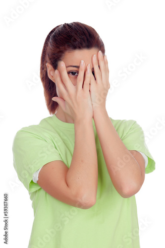Photo: Woman covering her face with hands Woman covering her face with hands