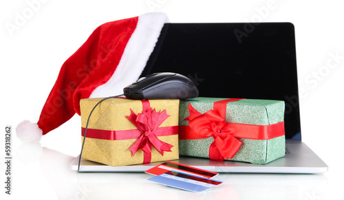 Photo: Laptop, gift and computer mouse isolated on white Laptop, gift and computer mouse isolated on white