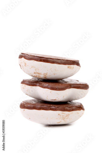 Photo: Stack of heart shape chocolate meringues. Stack of heart shape chocolate meringues.