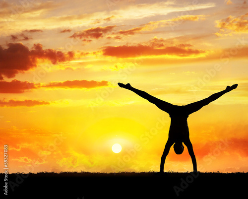 Photo: Yoga handstand silhouette Yoga handstand silhouette