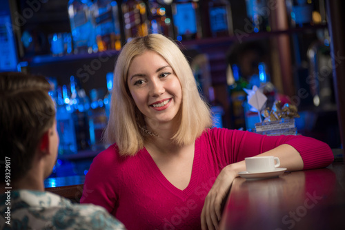 Photo: portrait of a nice woman at the bar portrait of a nice woman at the bar