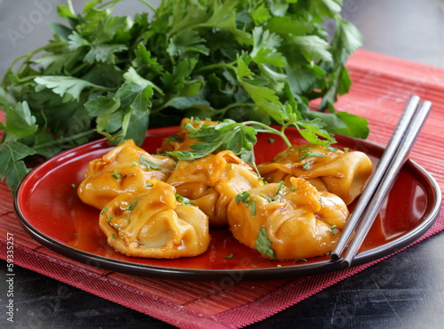 Photo: Chinese dumplings - dim sum with sour-sweet sauce Chinese dumplings - dim sum with sour-sweet sauce