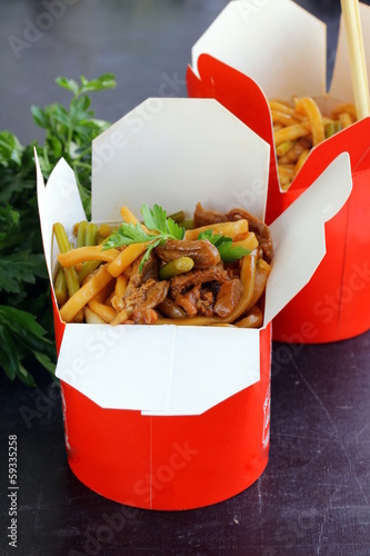 Photo: Chinese noodles with vegetables and meat in cardboard box Chinese noodles with vegetables and meat in cardboard box