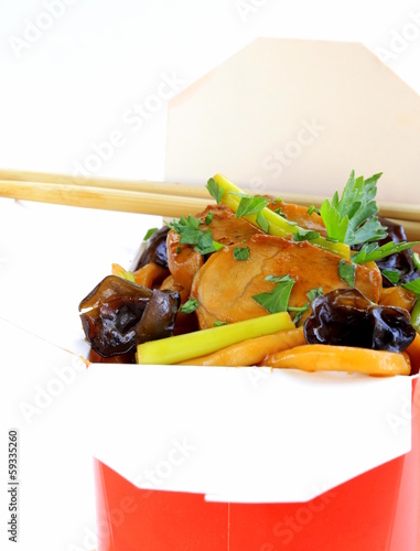 Photo: Chinese noodles with vegetables and meat in cardboard box Chinese noodles with vegetables and meat in cardboard box