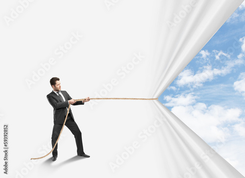 Photo: man pulling rope man pulling rope