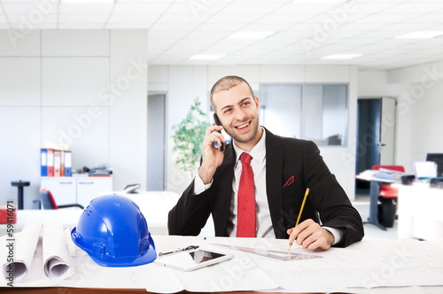 Photo: Architect in his office Architect in his office