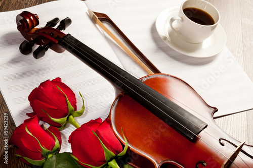 Photo: Red roses and a violin Red roses and a violin
