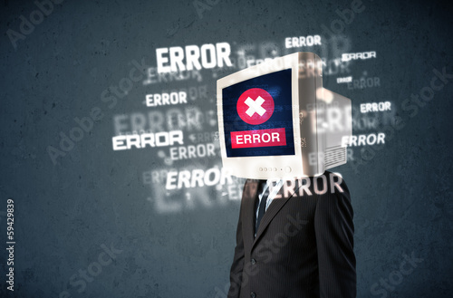 Photo: Business man with pc monitor on his head and error messages on t Business man with pc monitor on his head and error messages on t