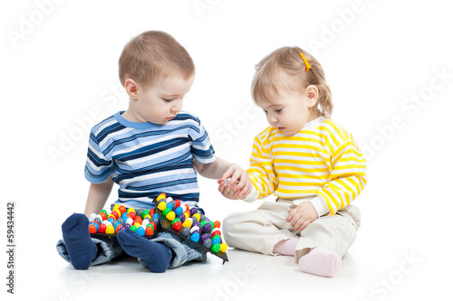 Photo: kids play with mosaic toy kids play with mosaic toy