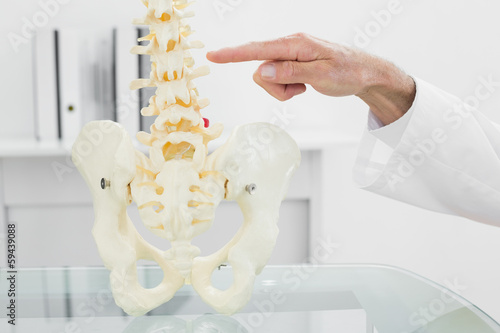 Photo: Finger pointing at skeleton model Finger pointing at skeleton model