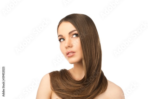 Photo: Beautiful young girl with long hair around her neck Beautiful young girl with long hair around her neck