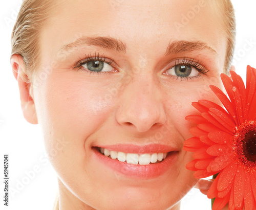 Photo: A beautiful young woman with a flower A beautiful young woman with a flower