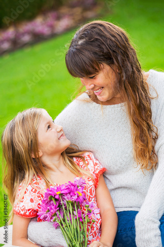 Photo: Portrait of happy mother and daughter Portrait of happy mother and daughter