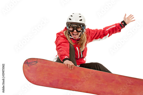Photo: Female snowboarder jumping, isolated on white background Female snowboarder jumping, isolated on white background