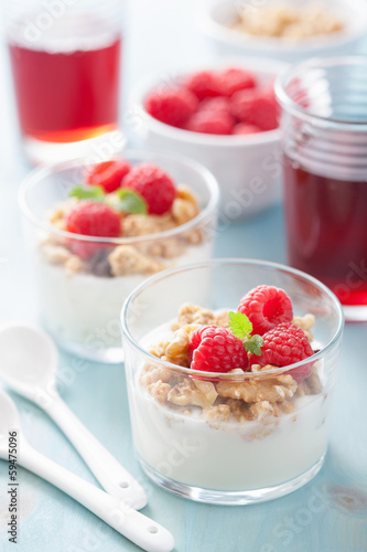 Photo: healthy breakfast with yogurt granola and raspberry healthy breakfast with yogurt granola and raspberry