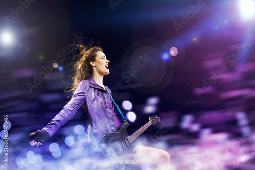 Photo: Rock passionate girl with wings Rock passionate girl with wings