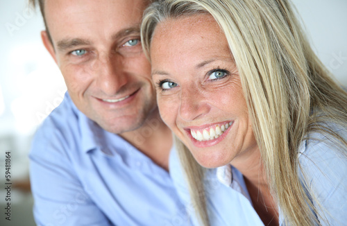 Photo: Portrait of cheerful blond couple Portrait of cheerful blond couple
