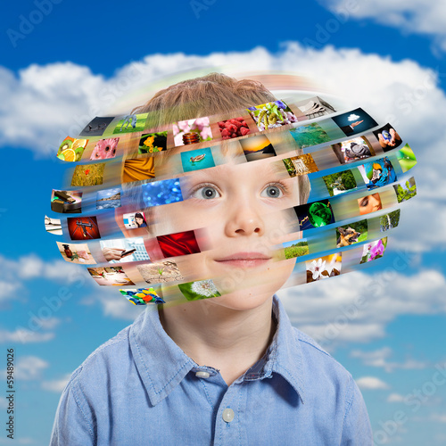Photo: Young boy. Technology concept. Young boy. Technology concept.