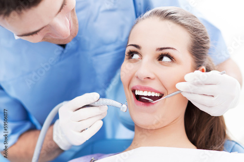 Photo: Dentist and patient in dentist office Dentist and patient in dentist office