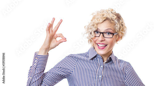 Photo: Happy smile woman gesturing ok Happy smile woman gesturing ok