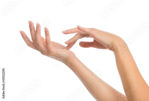 Photo: Beautiful woman hands with french manicure nails Beautiful woman hands with french manicure nails