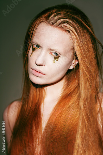 Photo: Bodyart. Fanciful Red Hair Woman with Creative Stagy Art Make-up Bodyart. Fanciful Red Hair Woman with Creative Stagy Art Make-up