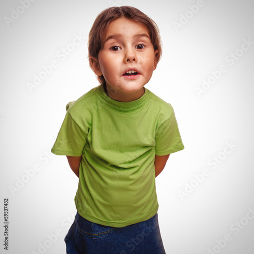 Photo: baby little girl swears emotions proves isolated on white backgr baby little girl swears emotions proves isolated on white backgr