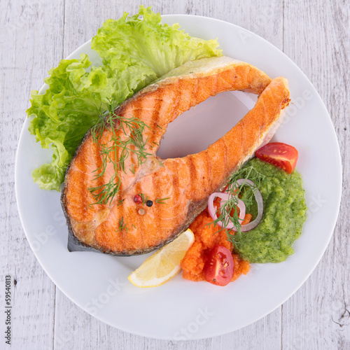 Photo: grilled salmon steak and vegetables grilled salmon steak and vegetables