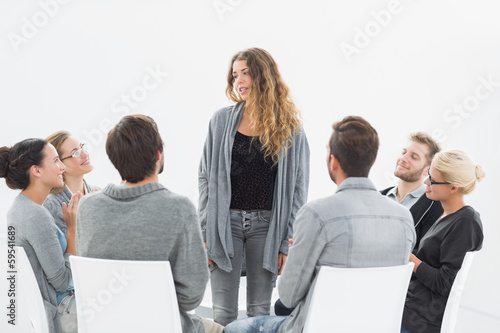 Photo: Group therapy in session sitting in a circle Group therapy in session sitting in a circle