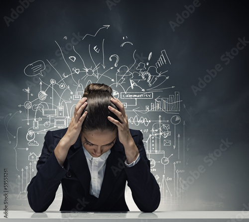 Photo: Depressed businesswoman Depressed businesswoman