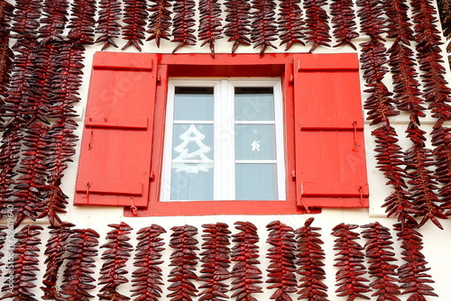 Photo: Espelette peppers surrounding the window Espelette peppers surrounding the window