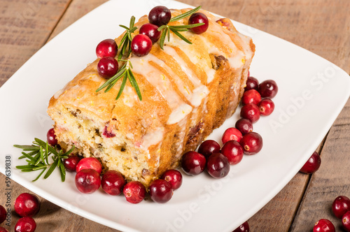 Photo: Cranberry walnut bread on a white plate Cranberry walnut bread on a white plate