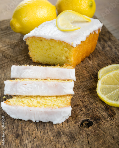 Photo: Sliced lemon pound cake with white icing Sliced lemon pound cake with white icing