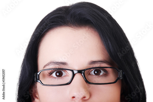 Photo: Female's face with eyeglasses. Cut out. Female's face with eyeglasses. Cut out.