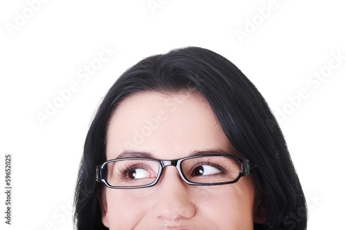 Photo: Female's face with eyeglasses. Cut out. Female's face with eyeglasses. Cut out.